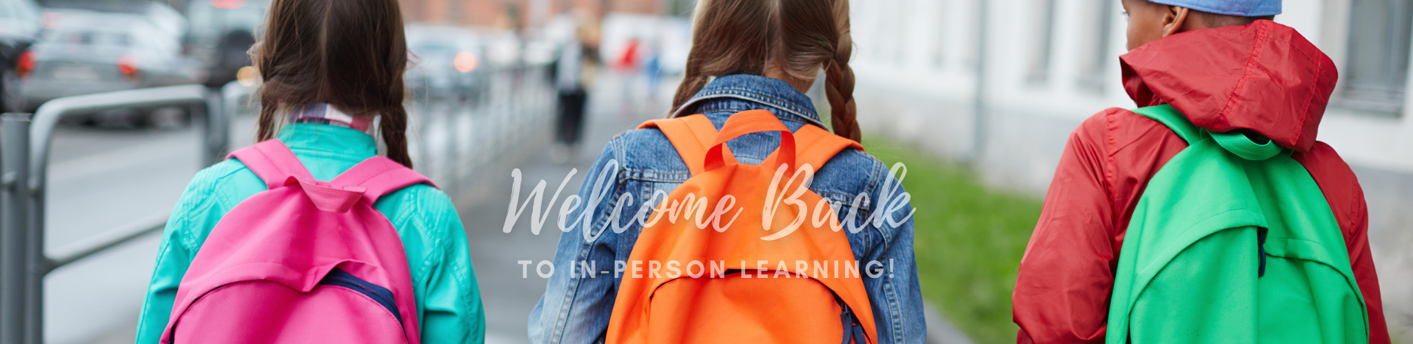 three girls with backpacks with text "Welcome Back to In Person Learning"