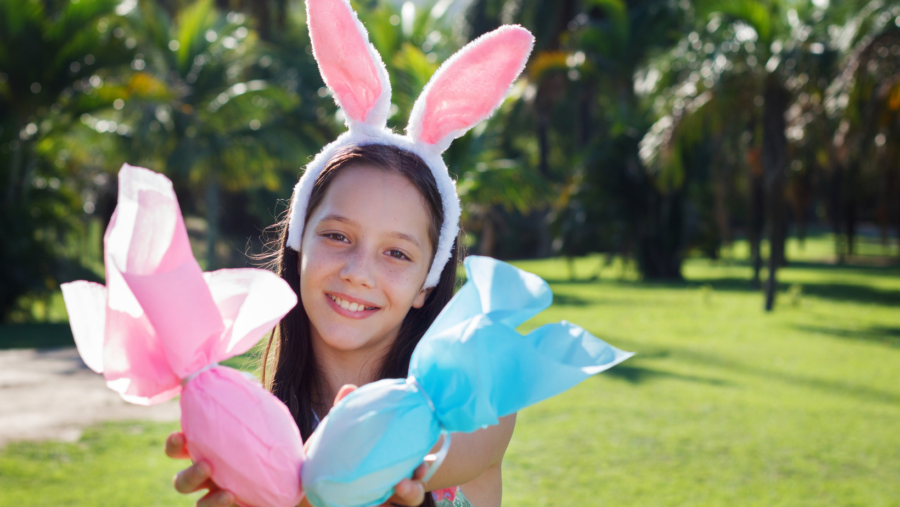 teen girl with bunny ears and easter eggs