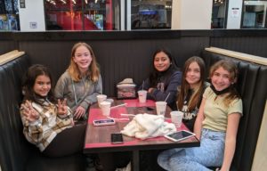 students at Round Table Pizza