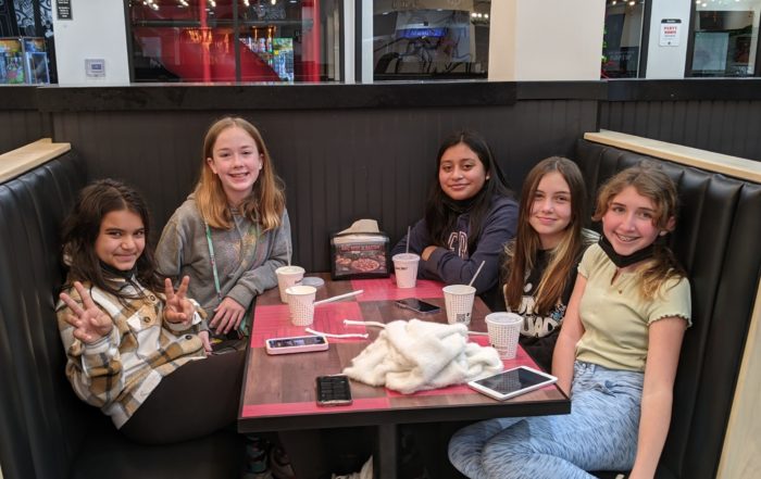 students at Round Table Pizza